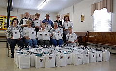 Reunion Committee Preparing Handouts 01